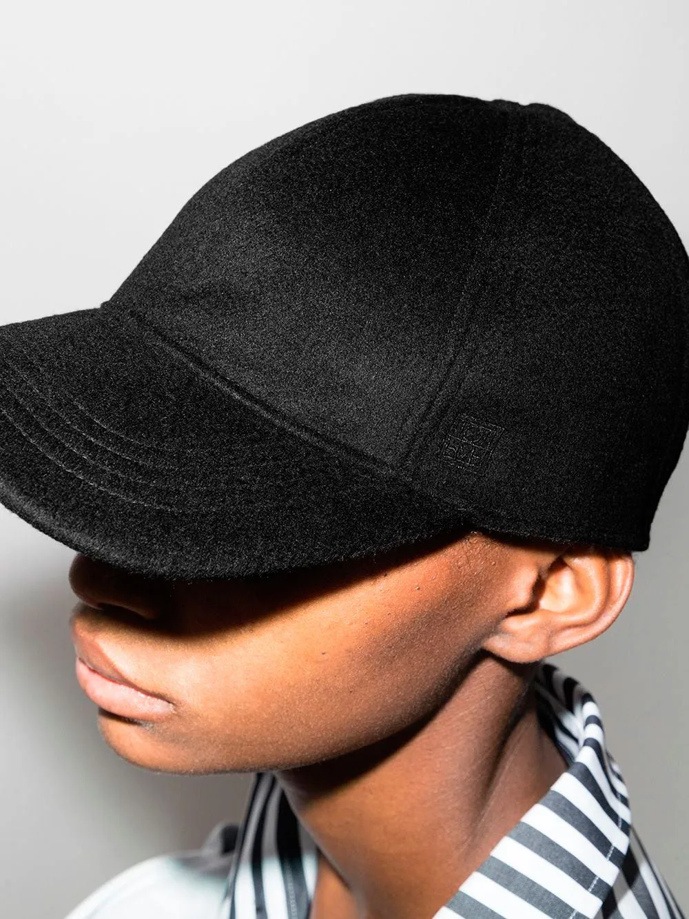 Curved-peak baseball cap