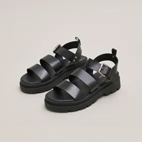 Platform sandals with buckles in black leather