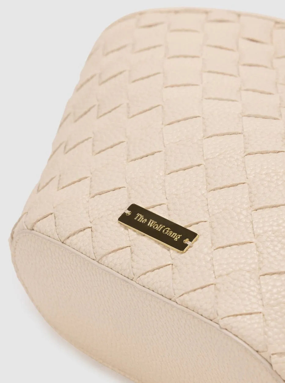 The Wolf Gang Daphne Woven Clutch in Ivory